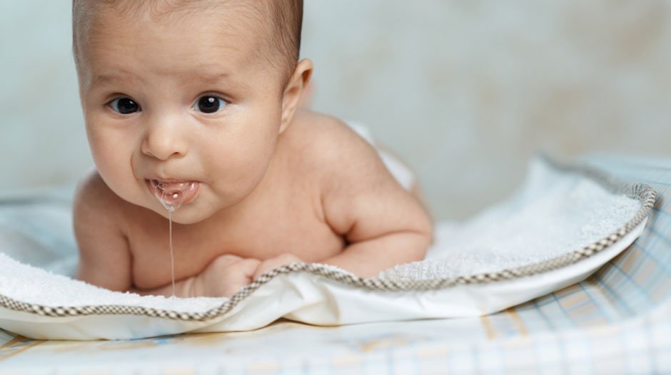 Baby Spitting Up Clear Liquid After Eating Causes, Symptoms, and Solutions